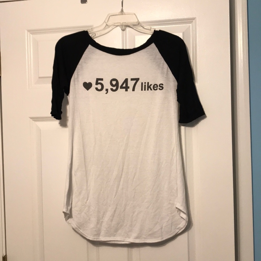 “Likes” tee